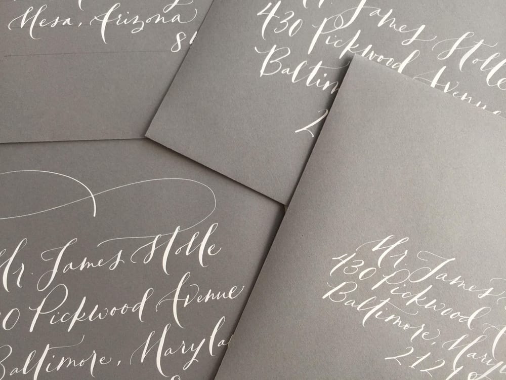white ink on grey envelopes - image 3 - student project