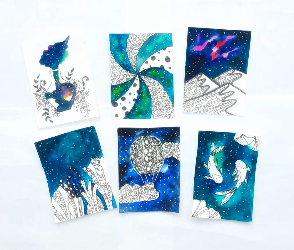 Ink and watercolor galaxy doodles - image 1 - student project