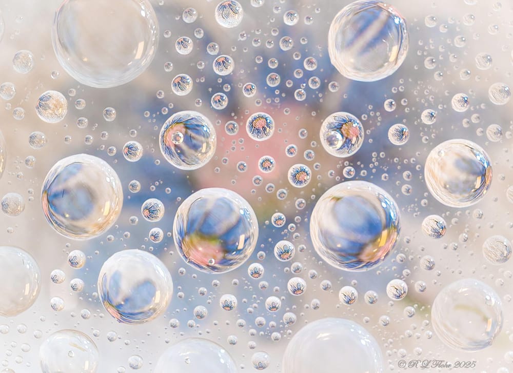 water droplets on 8x10 glass above flag or handkerchief handheld macro - image 1 - student project