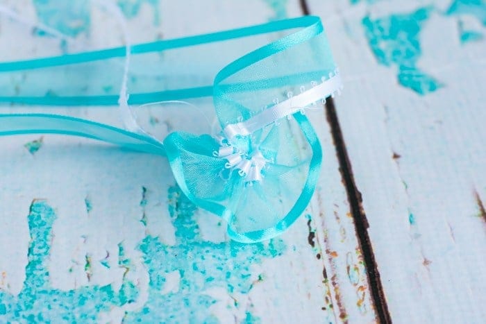 Turquoise and White Spiral Ribbon Lei - image 2 - student project