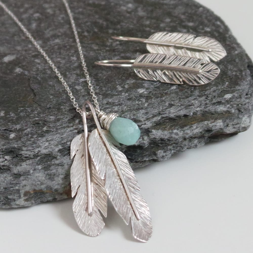 Feathers earrings - image 1 - student project