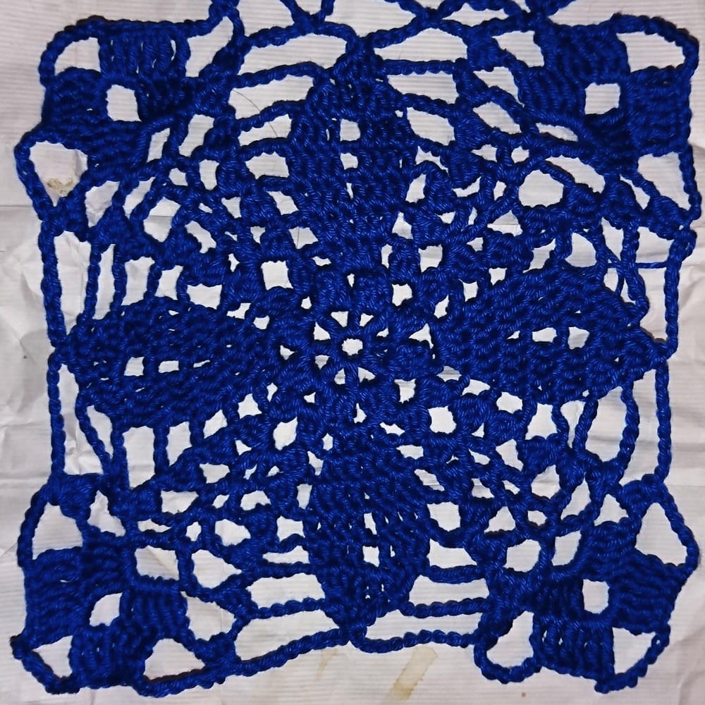Crochet square on crinkly paper - image 1 - student project