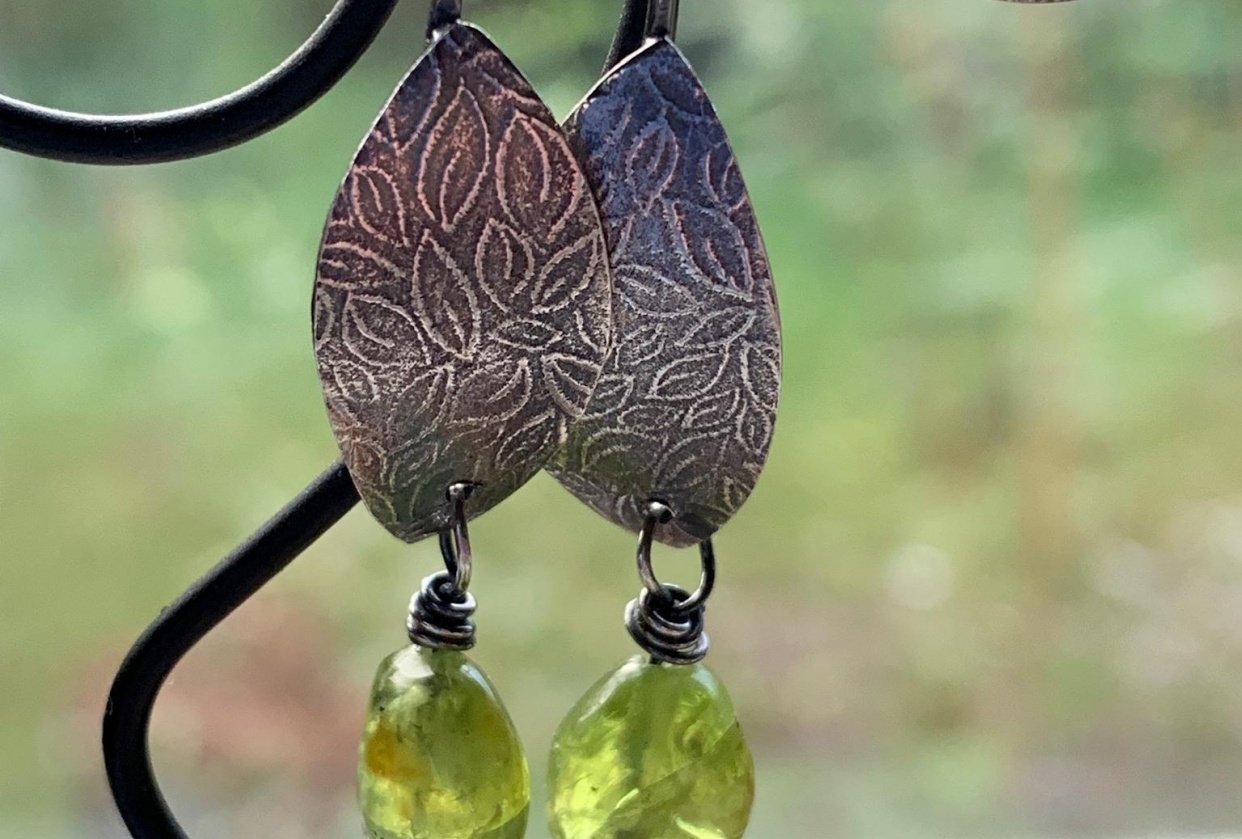 Silver and peridot, textured earrings - student project