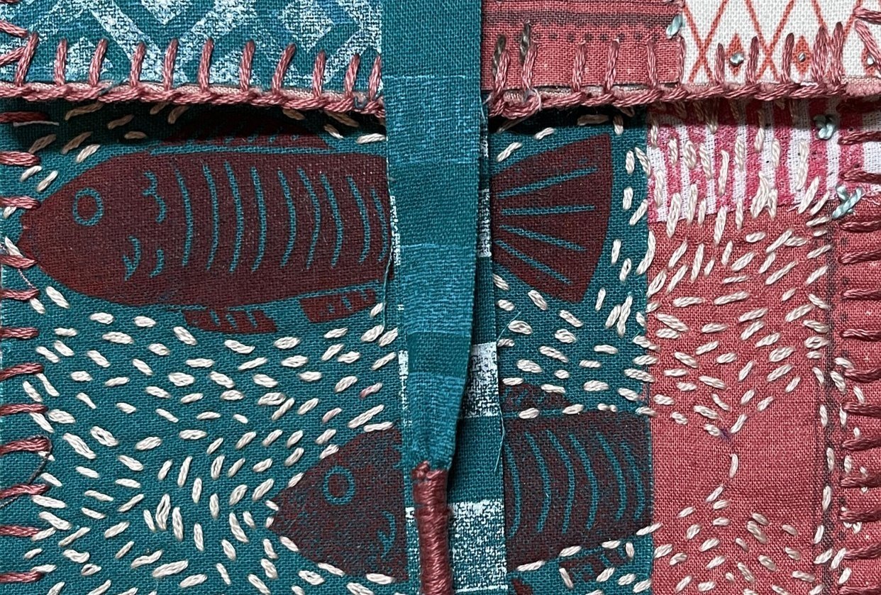 Hand stamped and stitched pouch - student project