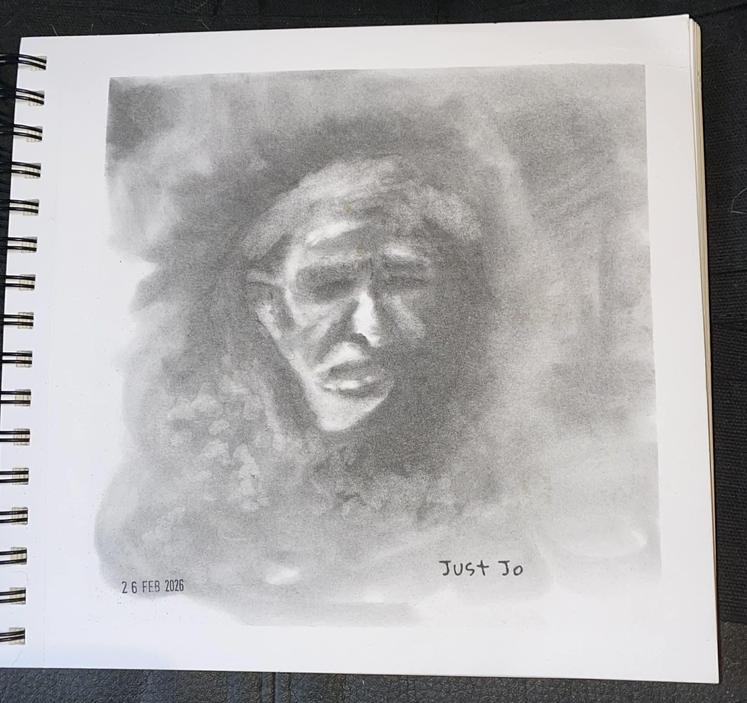 Charcoal portrait with a blending stump - image 1 - student project