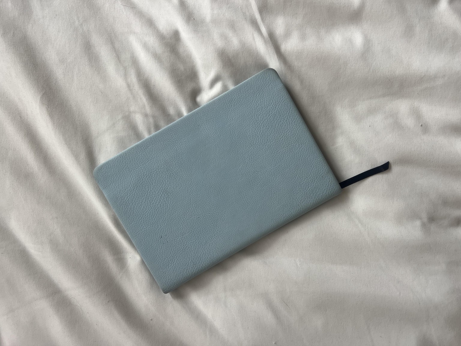 My self care journal that has yet to be decorated and my entries for the day - image 1 - student project