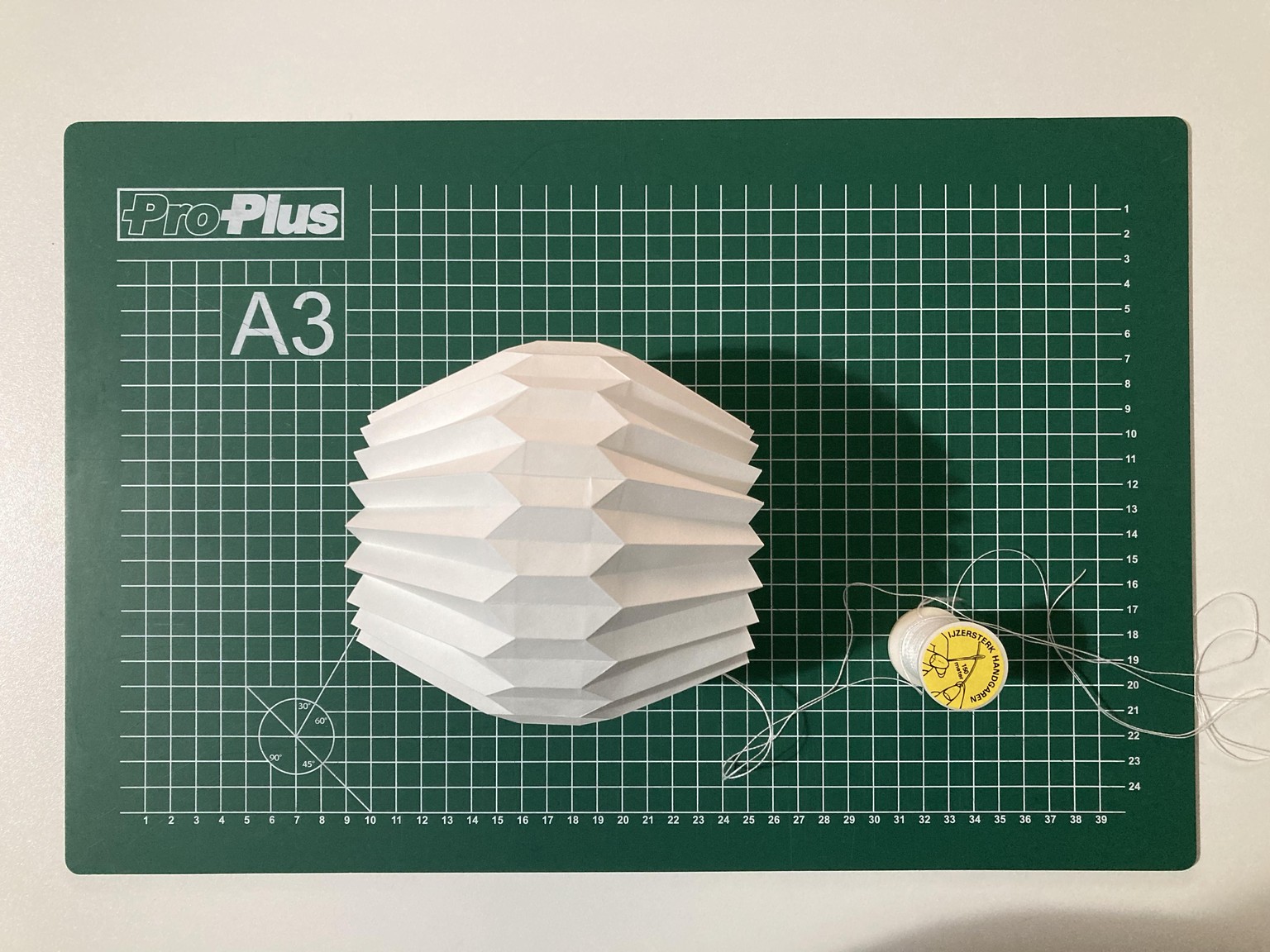Geometric Origami Paper Ornaments - image 4 - student project