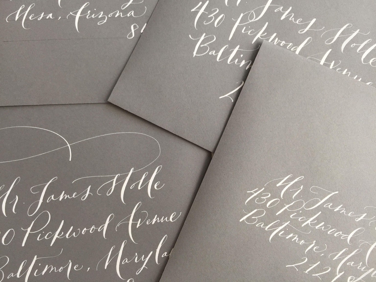 white ink on grey envelopes - image 3 - student project