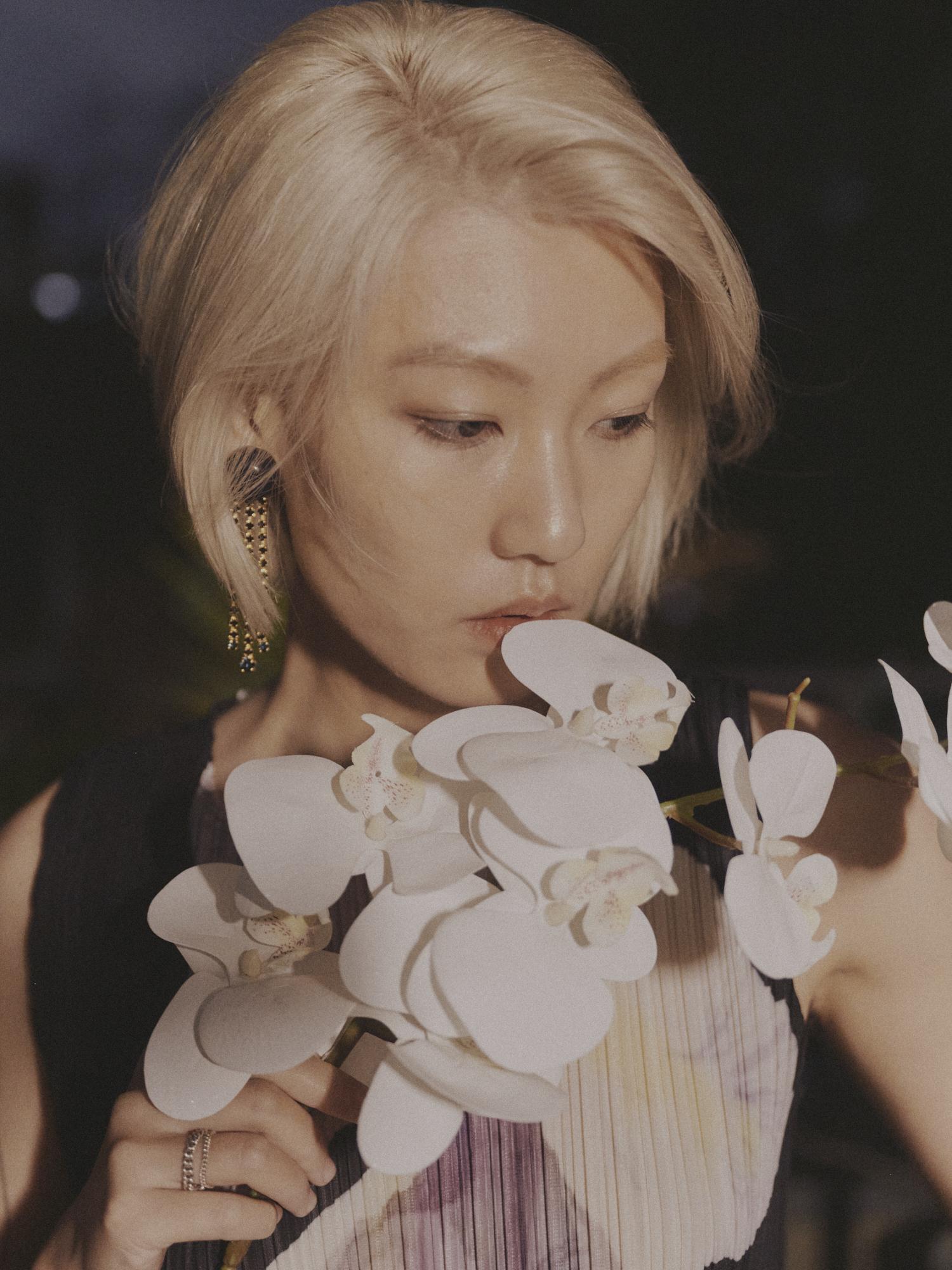 Nan with flower - image 1 - student project