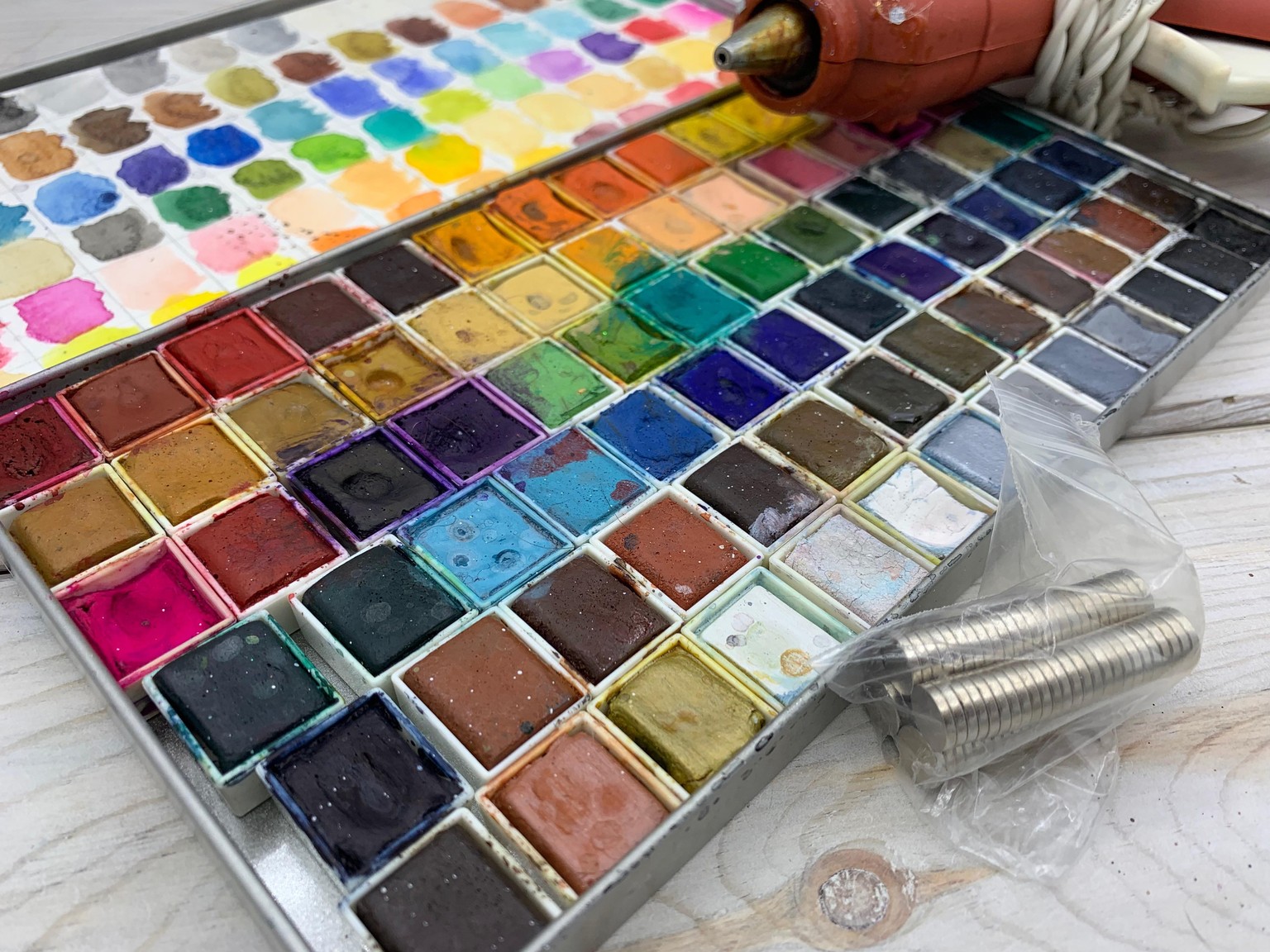 Consolidating all my watercolors using magnets and displaying my art supplies - image 2 - student project