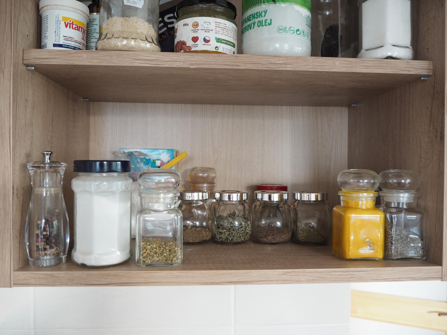 Using vertical space in a kitchen shelf for spices - image 1 - student project