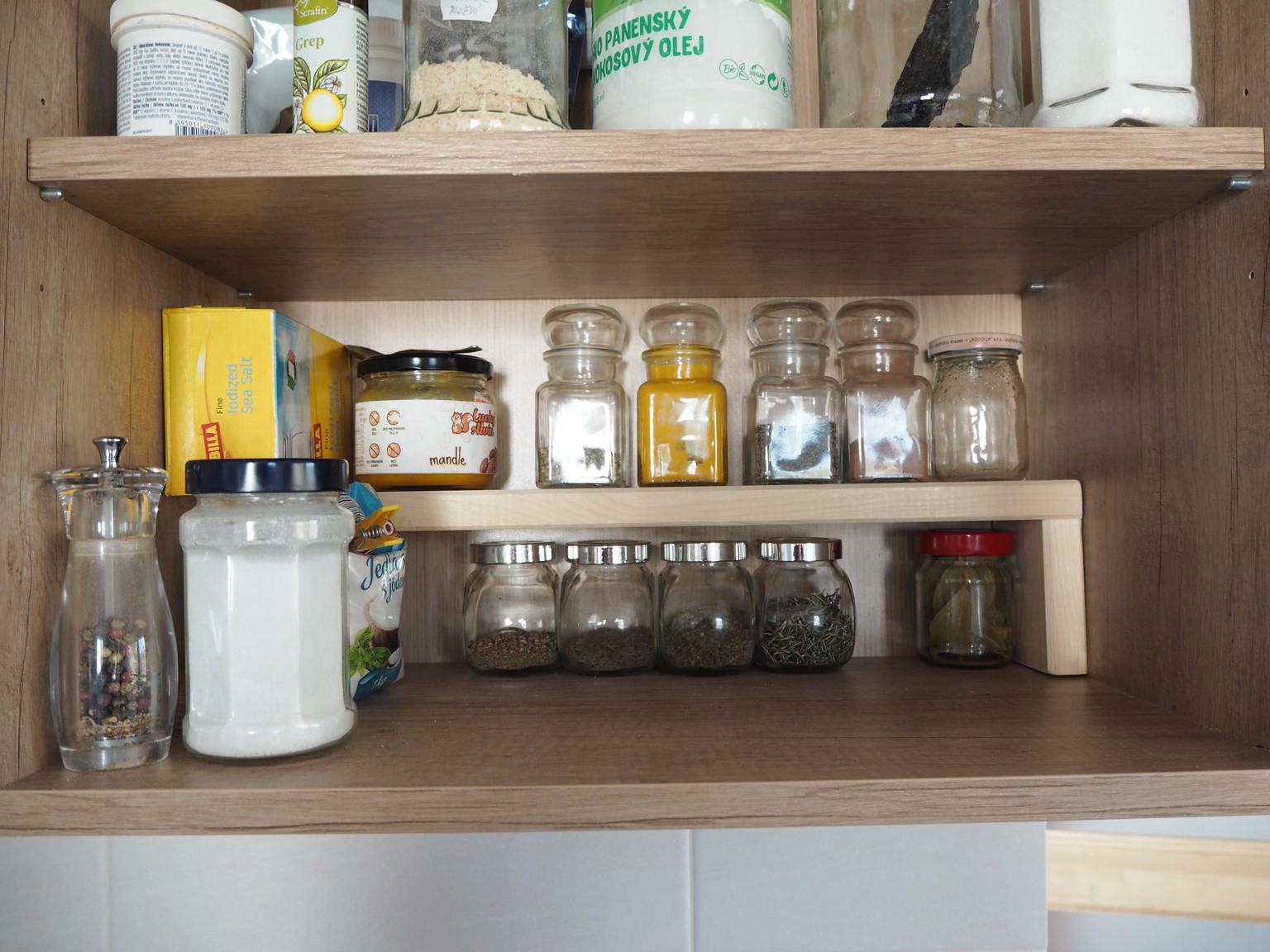 Using vertical space in a kitchen shelf for spices - image 2 - student project