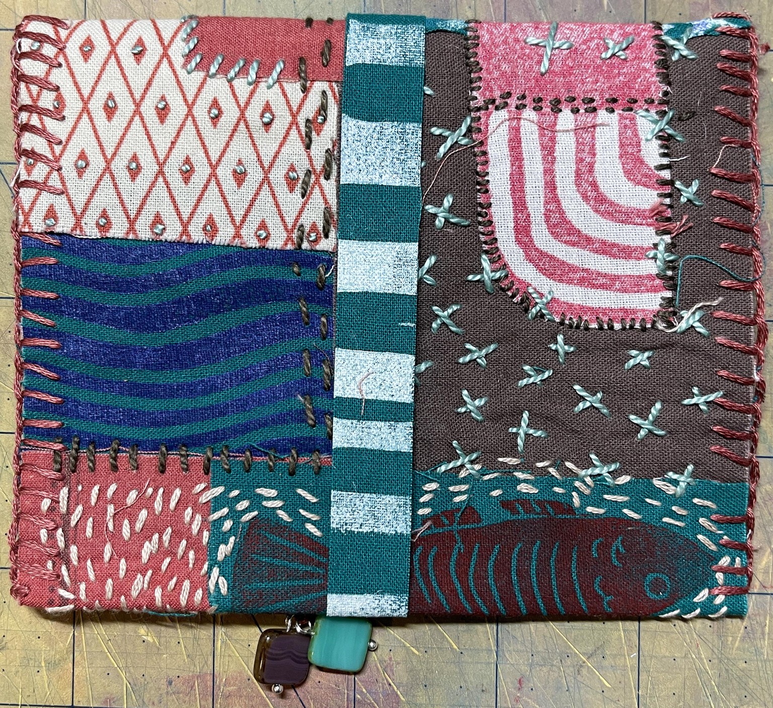 Hand stamped and stitched pouch - image 4 - student project