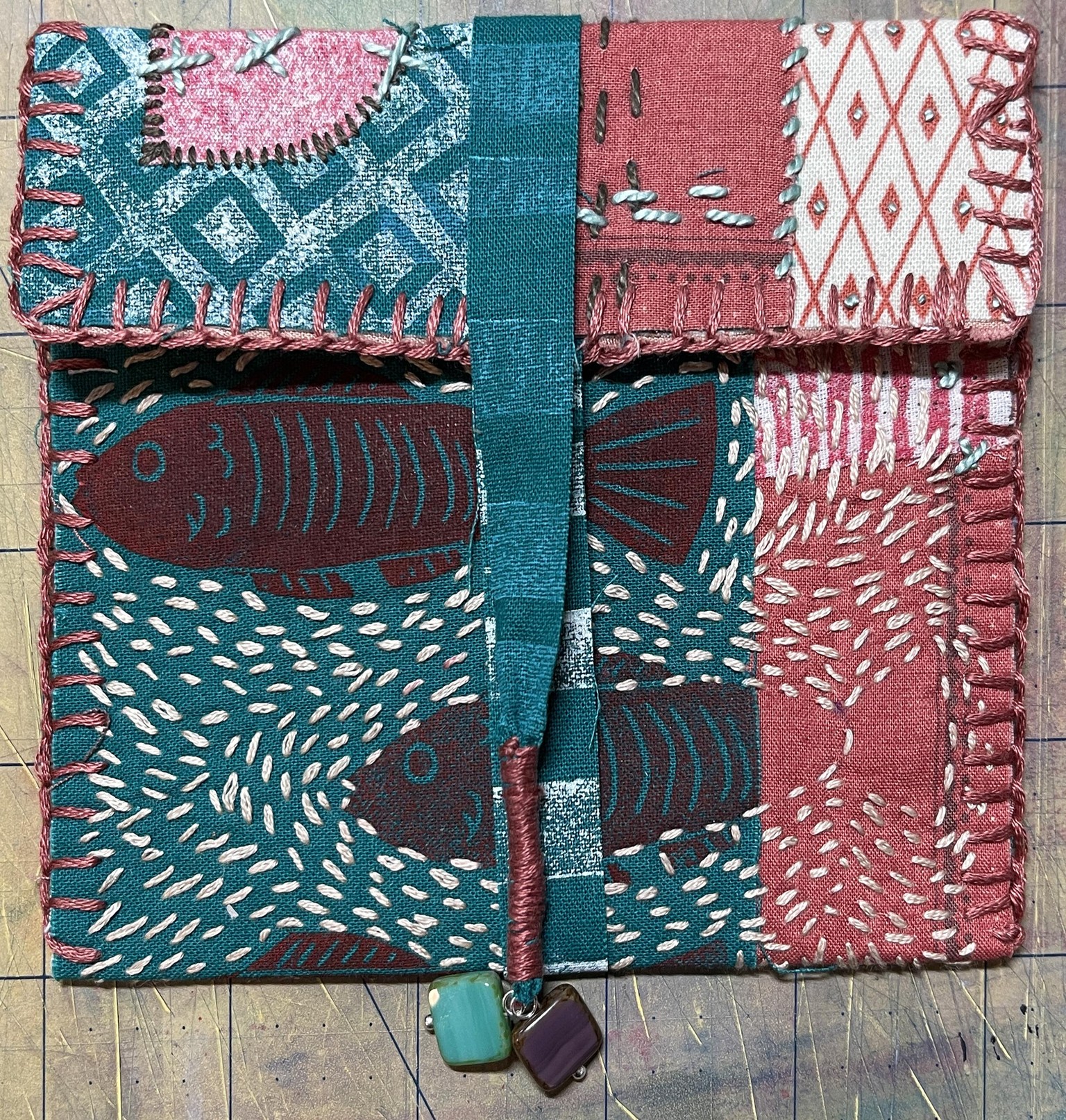 Hand stamped and stitched pouch - image 5 - student project