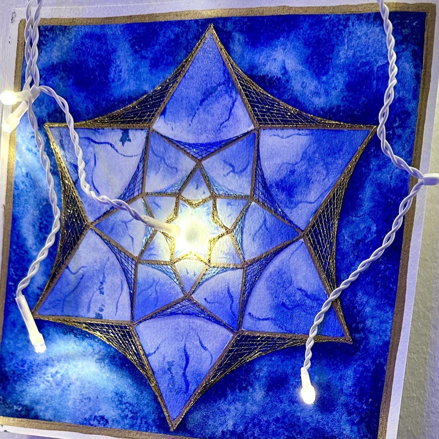 Paper-Stitched Festive Star - image 3 - student project