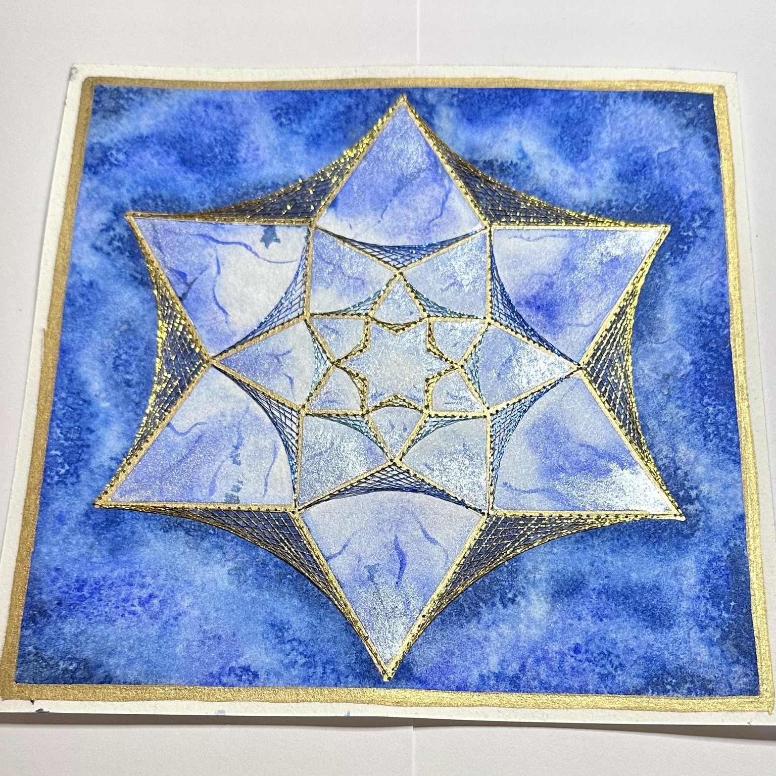 Paper-Stitched Festive Star - image 2 - student project