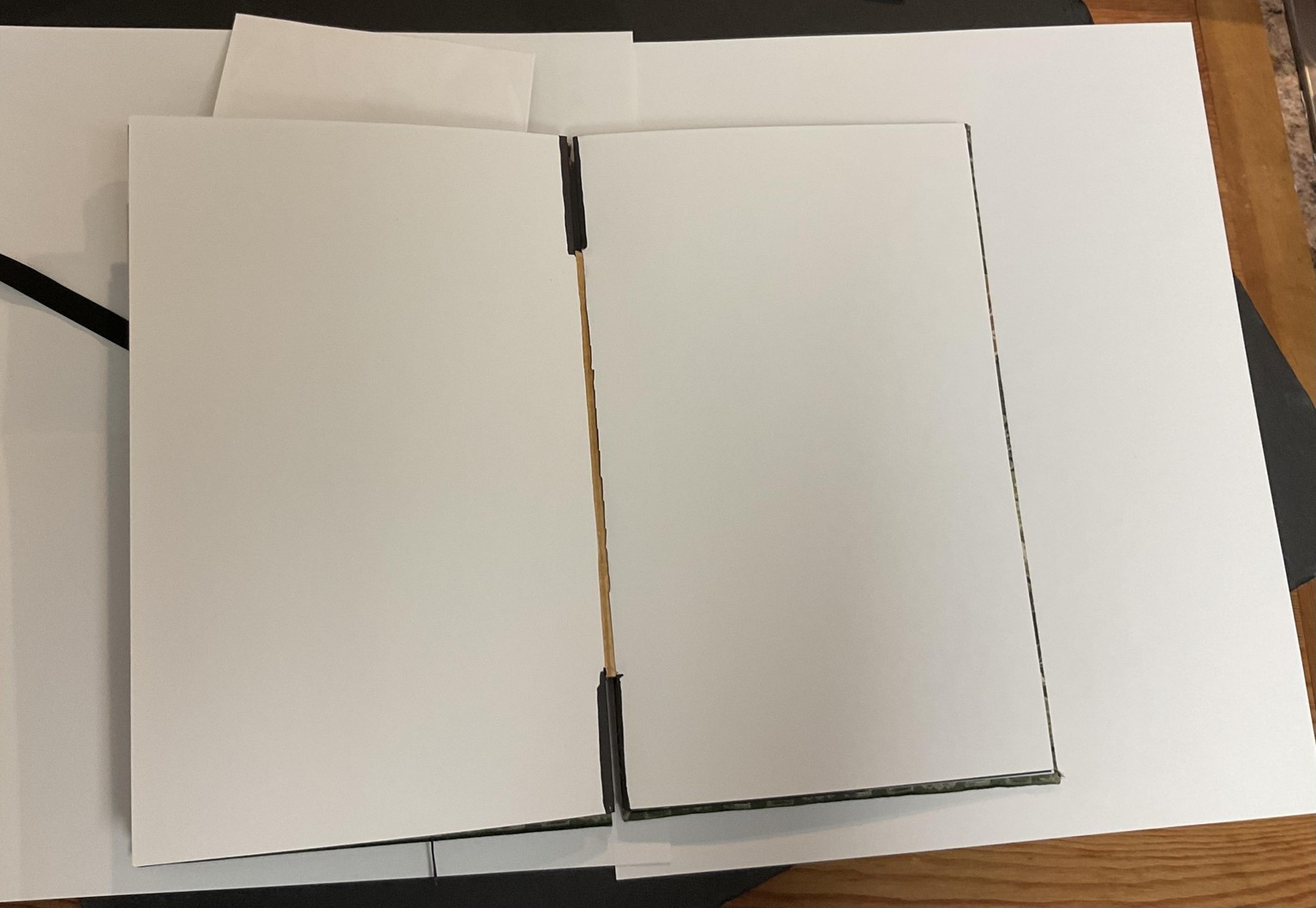 Accordion Hinge Binding with Decorative Papers - image 2 - student project