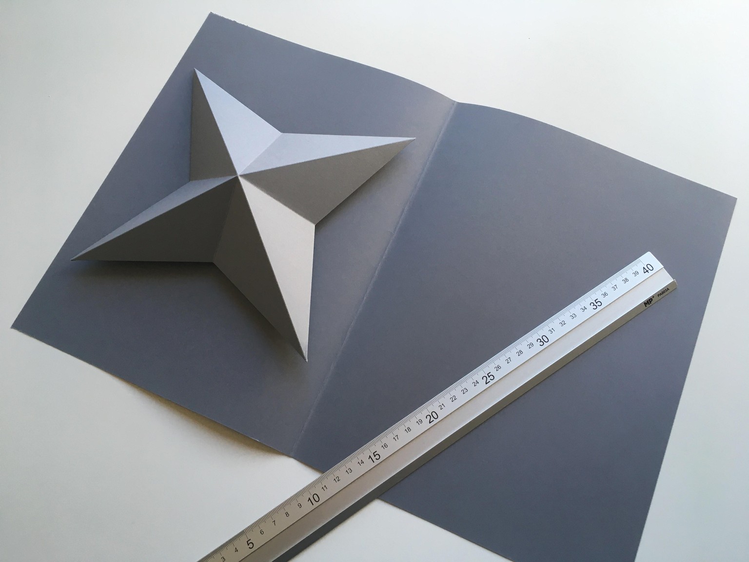 Geometric Star Paper Ornaments for Home Decor - image 3 - student project