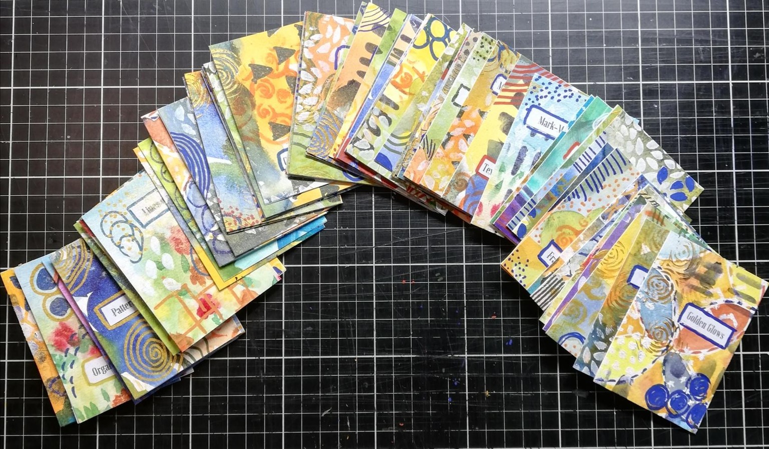 Colorful prompt cards with gold shimmer spray. - image 2 - student project