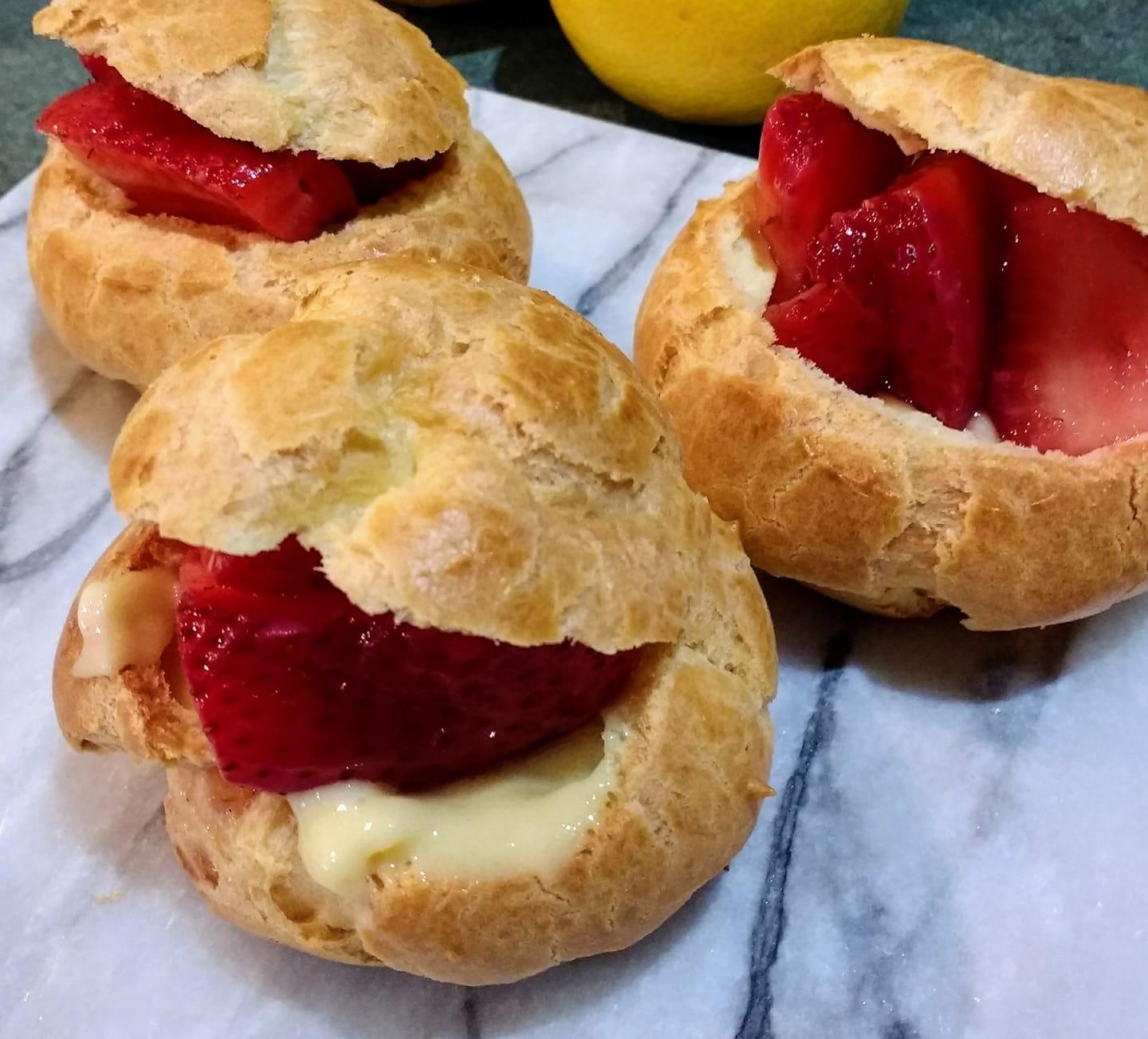 Choux a la creme with fresh, organic strawberries. - student project