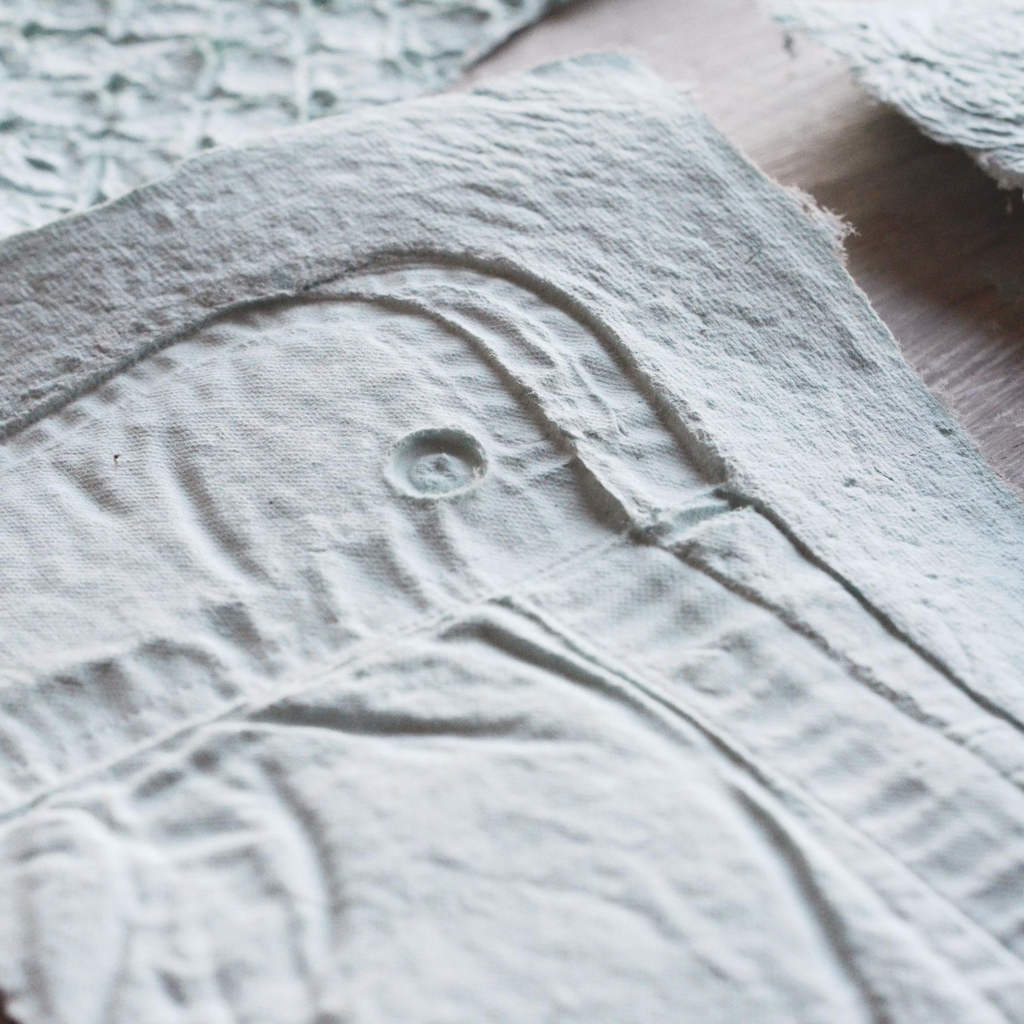 Shirt Sleeve Embossed Handmade Paper - student project