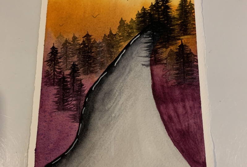 rainy winding forest road