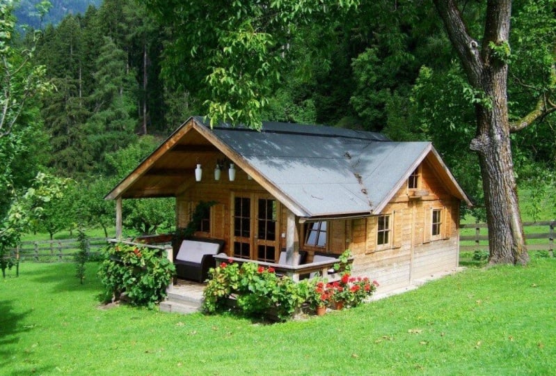 Wooden Cottage in a Forest