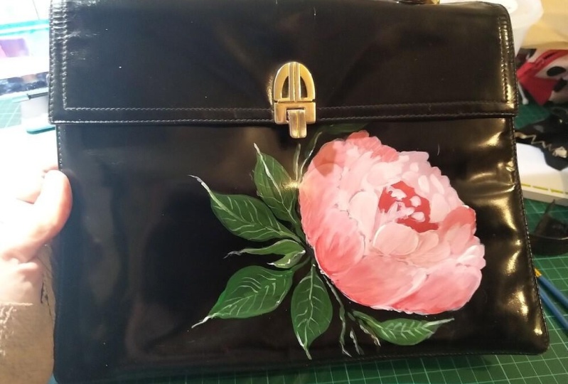 Flower on leather bag