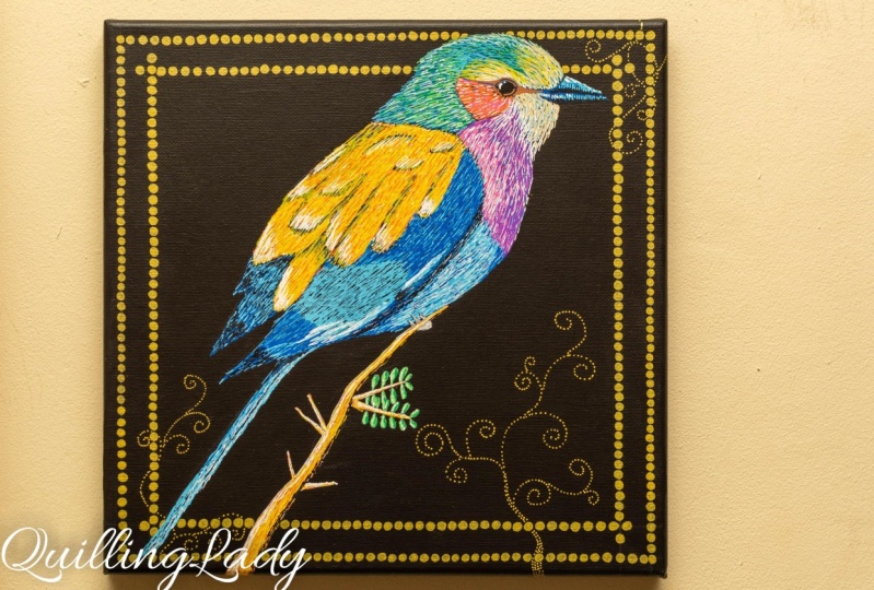 Bird with a gold frame
