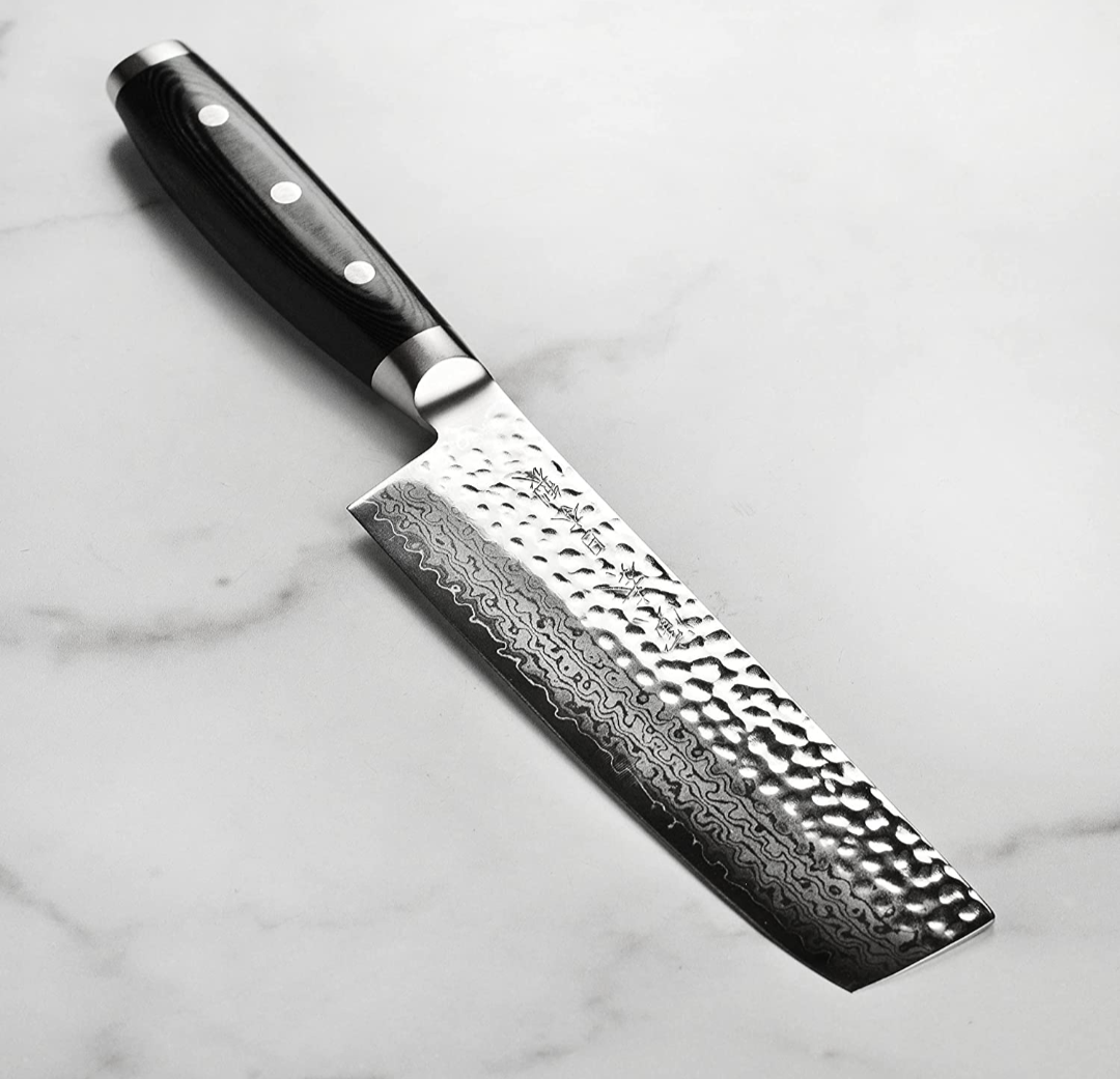 Knife sharpening by hand on ceramic stones - student project