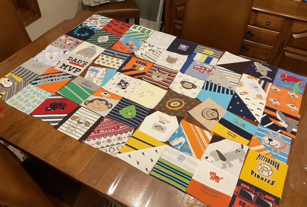 Baby clothes memory quilt in progress - student project