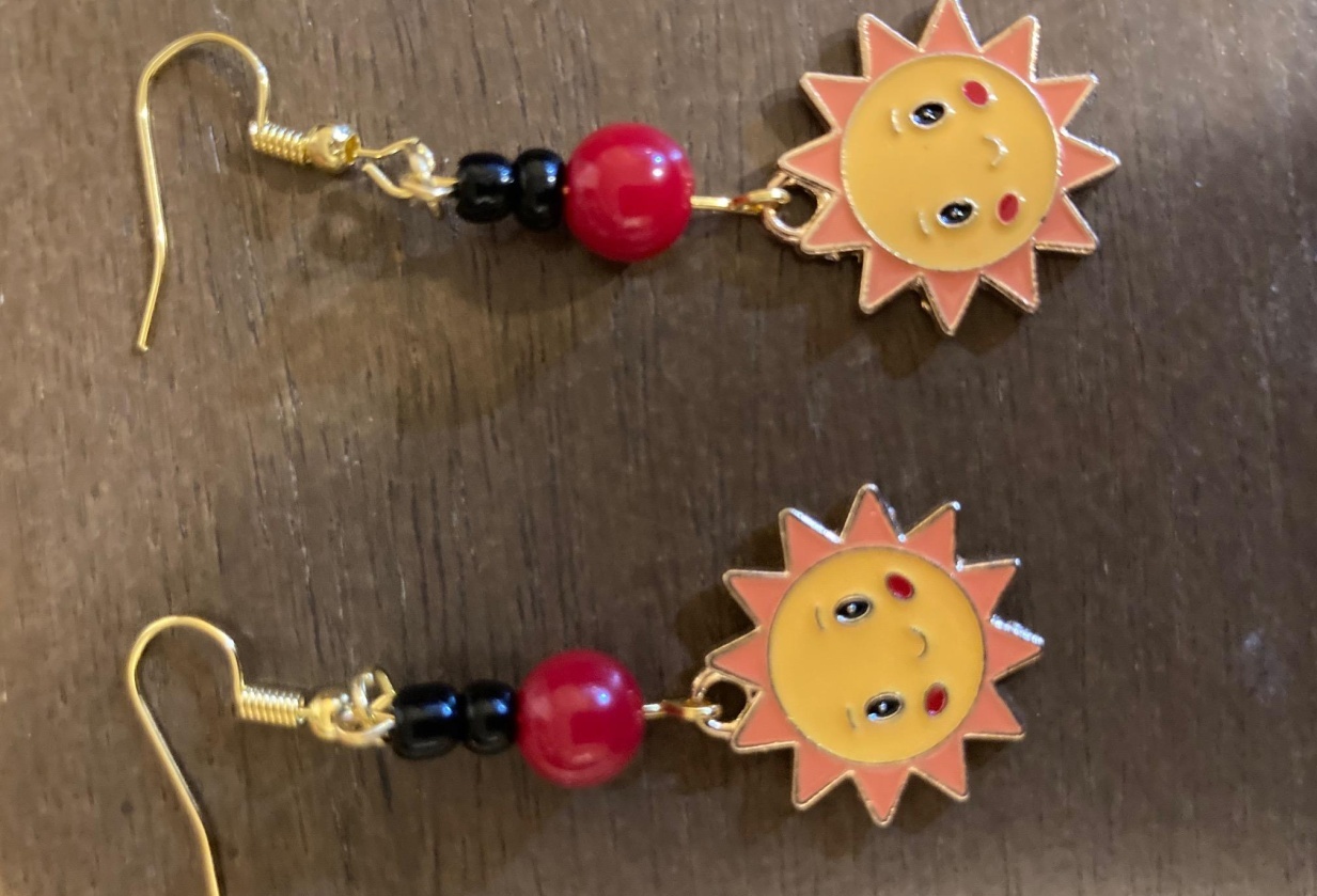 Sun charm earrings - student project