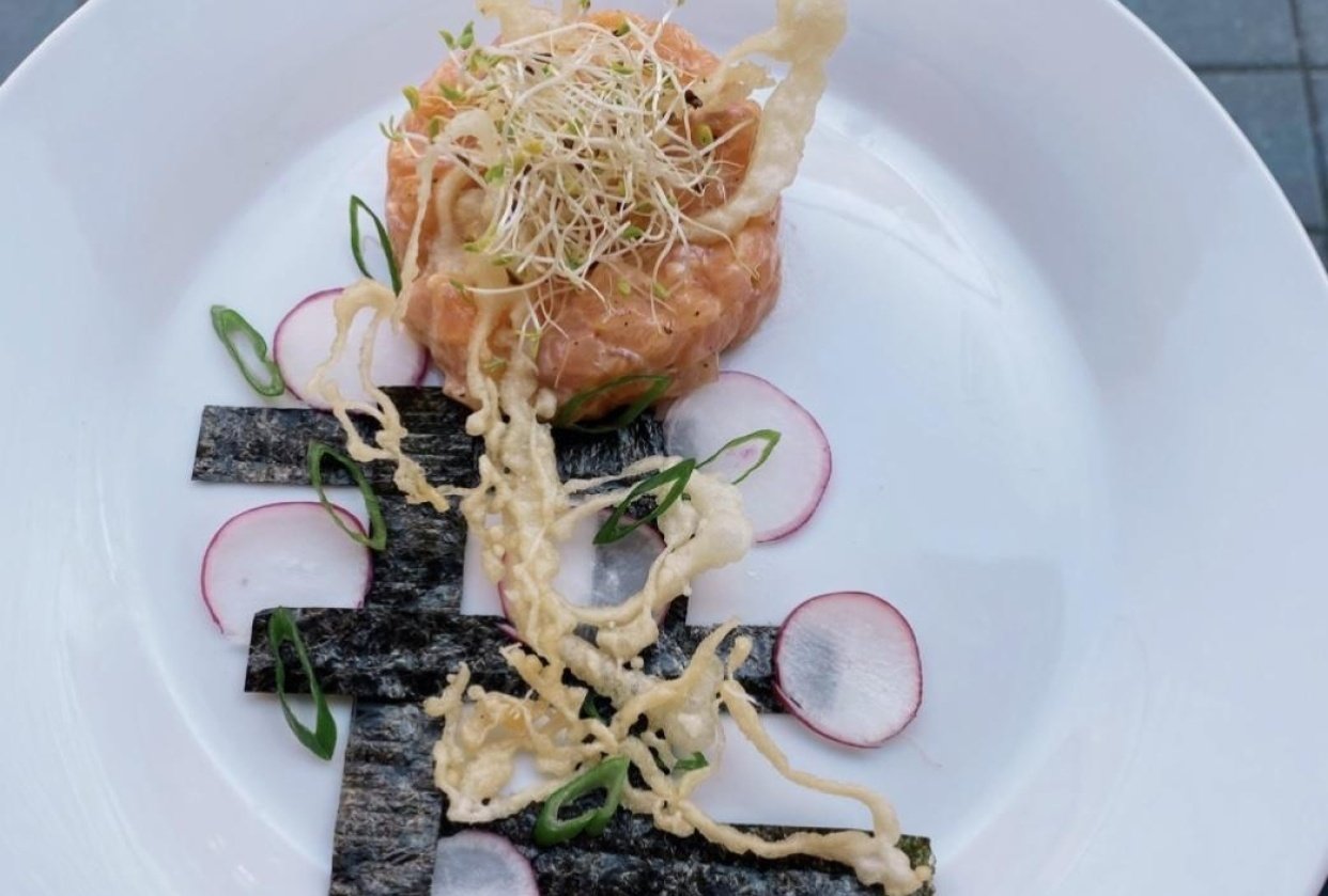 Salmon tartare with fried tempura , sliced pink radish and nori - student project
