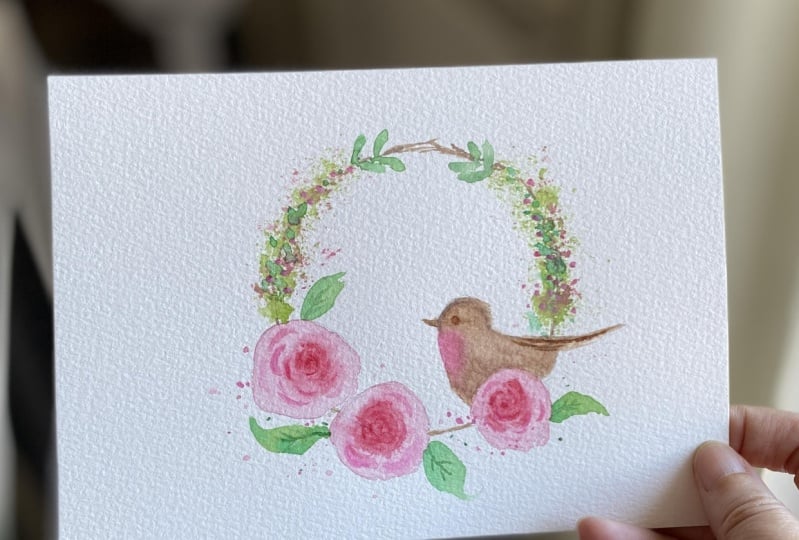Flower wreath and a little birdie