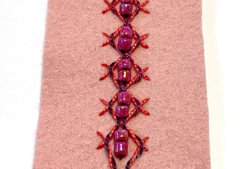 With beads!