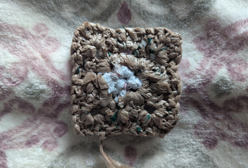 First Granny Square with Plastic Yarn