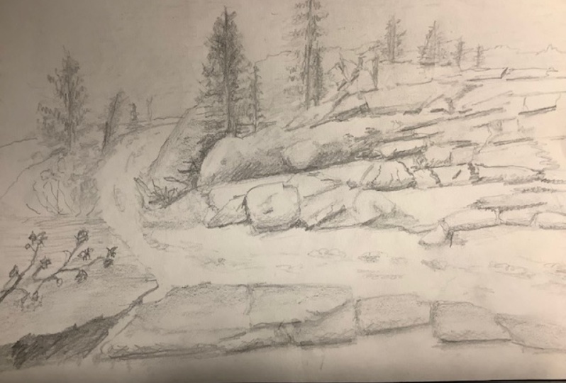 Rocky hillside with stream