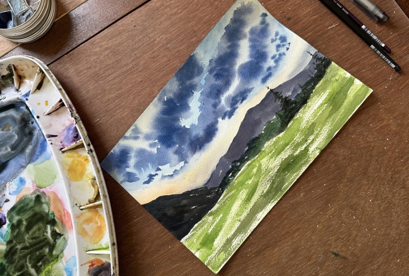 Atmospheric landscape with mountains and drama clouds