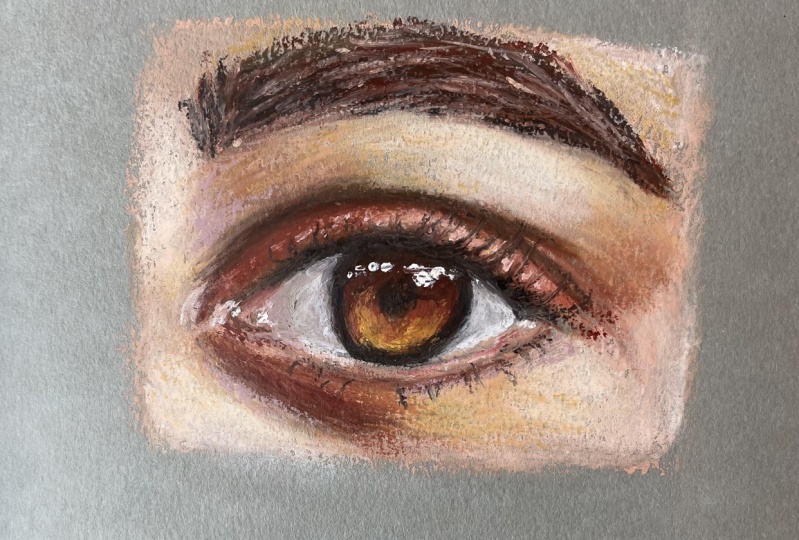 Painting an eye with oil pastels