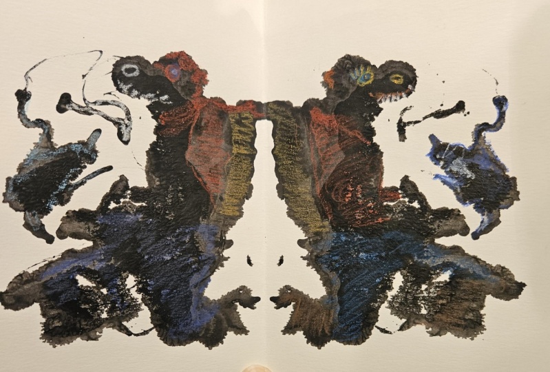 Ink blot cat chasing creatures