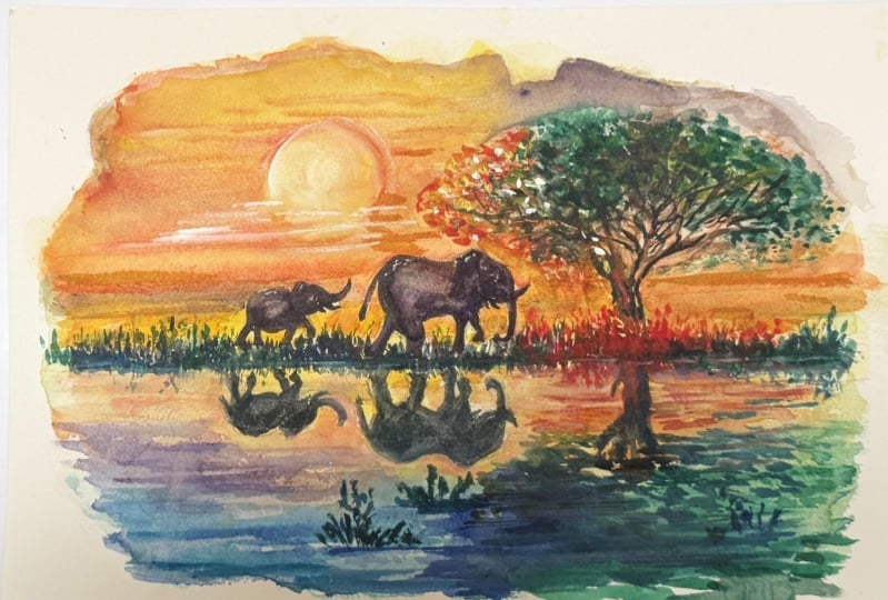 Elephants at sunset