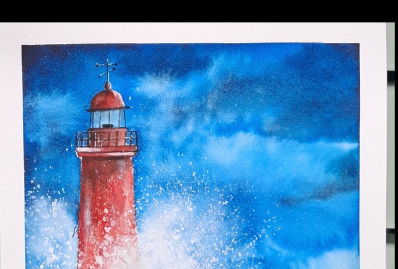 Vague s'écrasant sur un phare