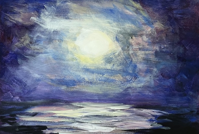 Moon rising over lake