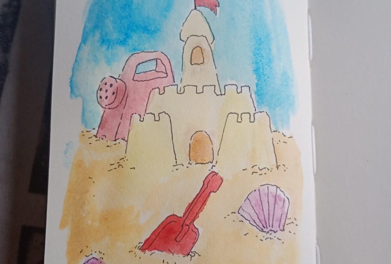 castillo de arena en acuarela
