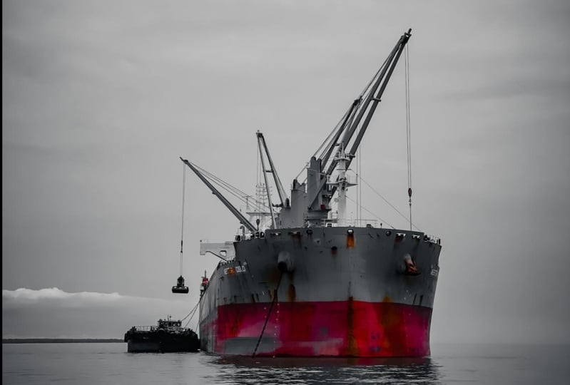 VESSEL DURING HER LOADING OPERATION AT INNER ANCHORAGE