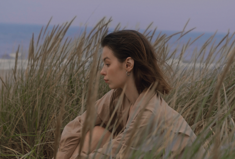 Sad girl at Beach - Thinking about Regrets