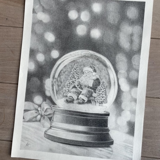 Santa snow globe with graphite pencils