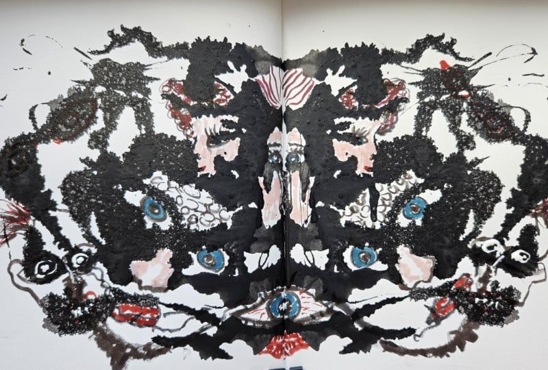 Ink blot tiny eyes