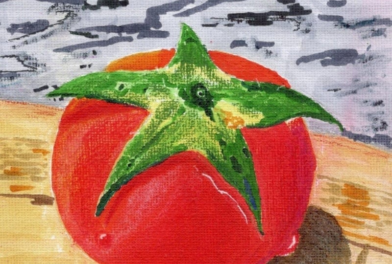 Tomato on Cutting Board