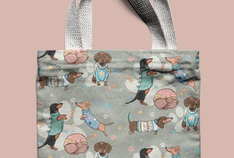 Dachshunds in sweaters tote bag